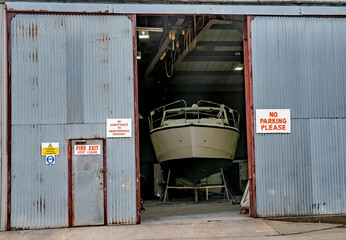  A leisure boat being repaired in the boat shed in Brundall marina