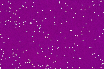 Dark purple felt textured fabric with glitter closeup background