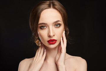 High Fashion Model Girl Portrait with Trendy Hair style and Makeup. Long Black Hairstyle, Black Hair and Red Matte Lipstick. Woman Makeup. Sexy Lips. Haircut