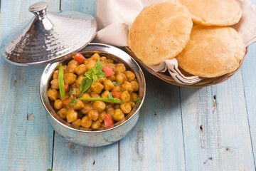 Channa Masala with Puri or Kabuli Chana with bhutara or spicy Chole, Indian Food