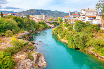 Fototapeta na wymiar Scenery of Mostar city in southern Bosnia and Herzegovina . View of Lucki most and Neretva River in Old Mostar Town