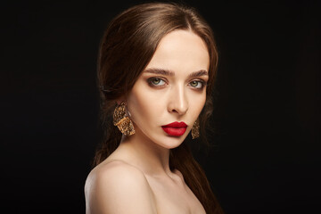 High Fashion Model Girl Portrait with Trendy Hair style and Makeup. Long Black Hairstyle, Black Hair and Red Matte Lipstick. Woman Makeup. Sexy Lips. Haircut