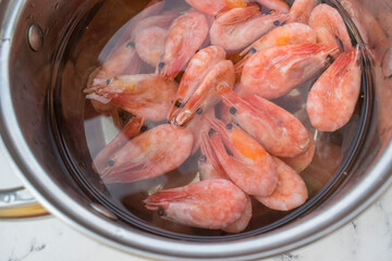 Prawns cooked in a pot of water