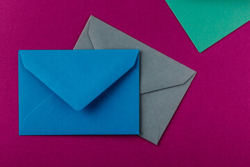 Colorful envelopes on a purple background.