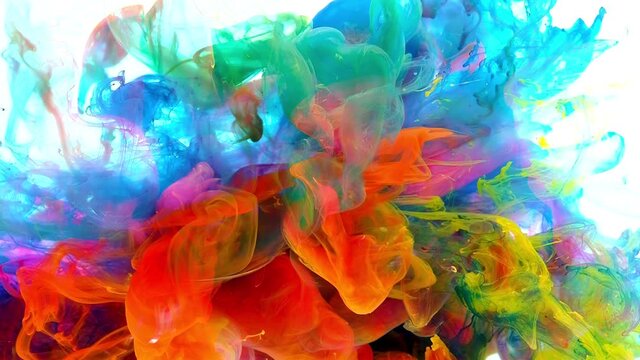 4K , Color paint drops in water. Colorful ink in water, 4K footage luxury colors.