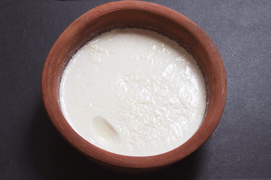 Home made curd in a earthen bowl