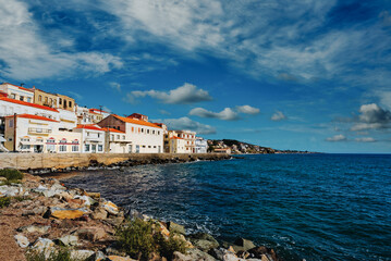 Fototapeta na wymiar Scenic coastal village of Plomari (Plomarion) on beautiful island Lesvos (Lesbos) in Greece.