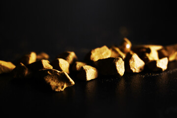 instant coffee granules on a black background. macro shot.