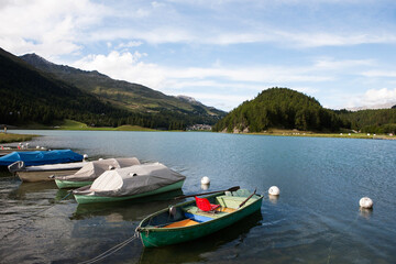 Fototapeta na wymiar Boat on Sils lake on Engadine valley-Switzerland