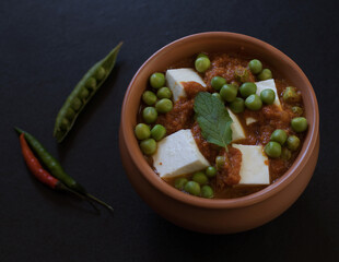 Mattar paneer, also known as matar paneer, and mutter paneer is a vegetarian North Indian dish consisting of peas and paneer in a tomato gravy