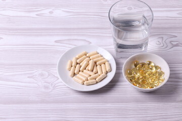 different dietary supplement pills and omega three capsules