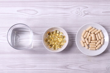 different dietary supplement pills and omega three capsules