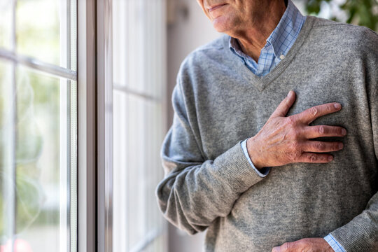 Senior man Suffering From Chest Pain
