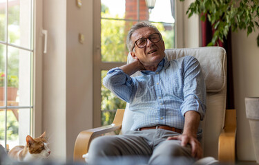 Fototapeta premium Senior man suffering from neck pain 