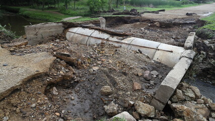 Road damage due to heavy rain and flash floods
