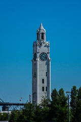 Clock Tower (Quai de l'Horloge), St Lawrence River and Jacques Cartier Bridge at Old Port. Montreal, Quebec, Canada.