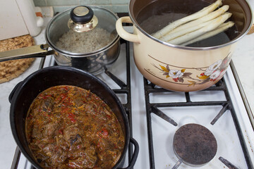 Beef goulash, pearl barley and asparagus.