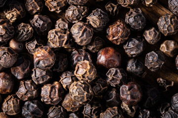 Black pepper closeup. Food background. Close up.