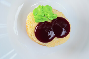 Fancy donuts on white plate