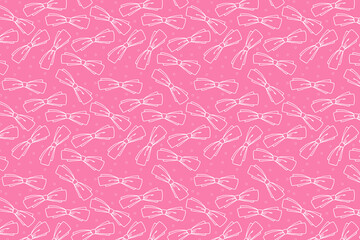 White bow shape pattern on a pink background.
