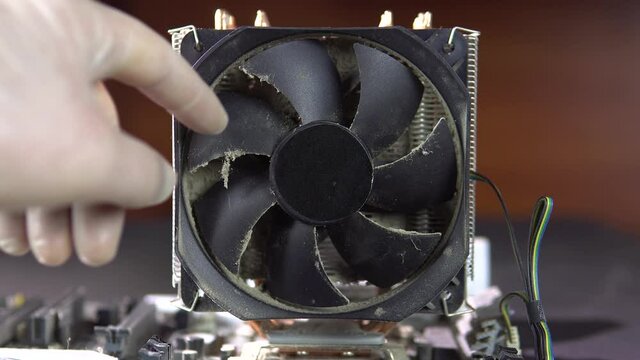 Demonstration of dust pollution. Dirty cooler and CPU heatsink from dust. 4k.