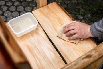 a rustic wooden chair will be glazed with oil