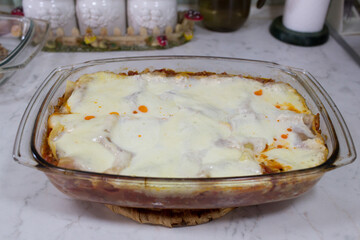 Preparation of lasagne.