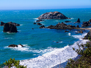 Big Sur is a sparsely populated region of the Central Coast of California where the Santa Lucia Mountains rise abruptly from the Pacific Ocean. 