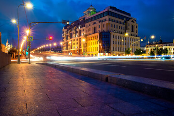 Night city, night traffic lights. City life, car light paths. Russia, Moscow, Maly Moskvoretsky bridge