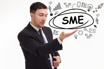 Business, technology, internet and network concept. Young businessman thinks over the steps for successful growth: SME