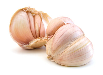 Stack garlic and mint on white background
