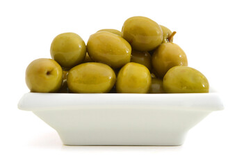 pickled green olives in a bowl  on a white background