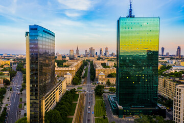 Beautiful panoramic aerial drone view to the Center of modern Warsaw city with silhouettes of...