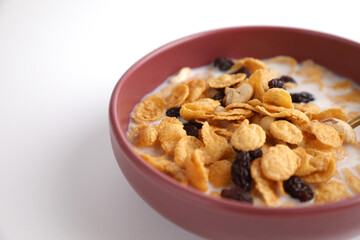 Cereal dessert with corn oat and dry fruits isolated in white background