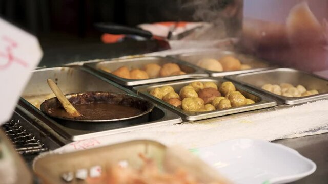Fried fish balls and eggs in a traditional Hong Kong street market