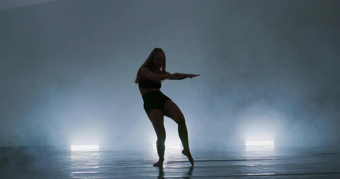 Contemporary dancing performers in dance practice class
