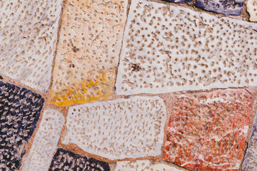 Ancient colorful mosaic floor with little dots