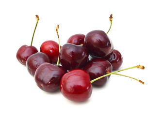 Handful of a red cherry on a white background