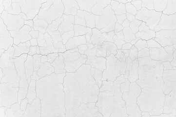 Crack white concrete wall ,Damaged Cement wall textured background