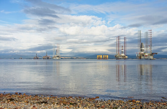 Stacked oil rigs viewed from the village of Cromarty in the Cromarty Firth Scotland