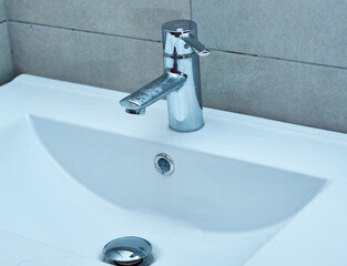 The photo of a sink in a bathroom