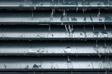 Close-up of rain drops on the shutter, detail