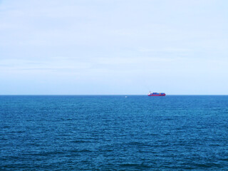 maritime landscape with sea and blue sky and clouds in the bay of Cadiz capital. Andalusia. Spain. Europe.
