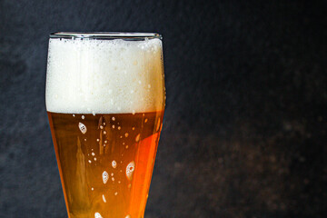 beer light unfiltered cold drink with foam Menu concept serving size. food background top view copy...