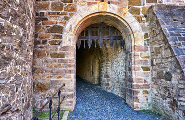 Stone wall with trap gate in Wernigerode Castle.