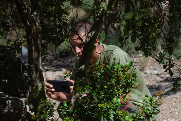 guy takes pictures sneaking up to take pictures