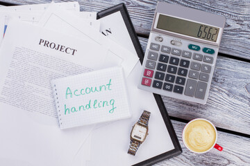 Account handling concept. Business paperwork with calculator and clock watch on white wooden table. Top view flat lay.