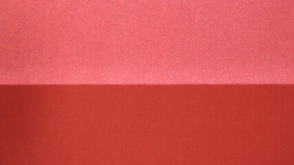 Fototapeta premium red paper or fabric background light above and dark below as an empty surface for design use