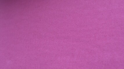 Fototapeta premium light purple background with grained texture of soft cardboard blurred along the borders of the picture