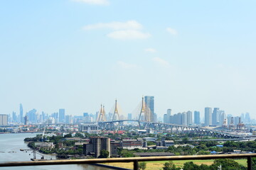 Great city view with beautiful hanging bridges that cross the river of Bangkok, Thailand.